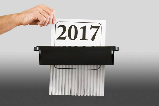 istock Destroying the Year 2017 in a Paper Shredder 891391622