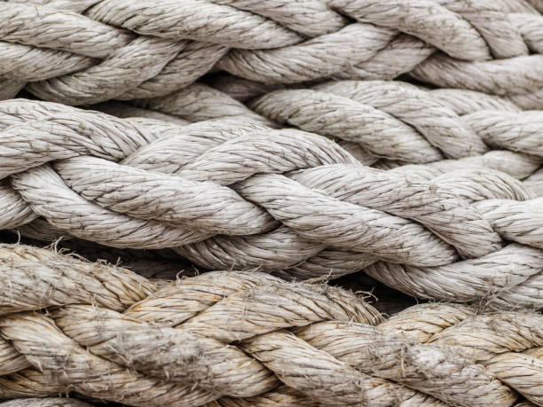 istock Old fashioned harbor marina sailboat ropes 891399596
