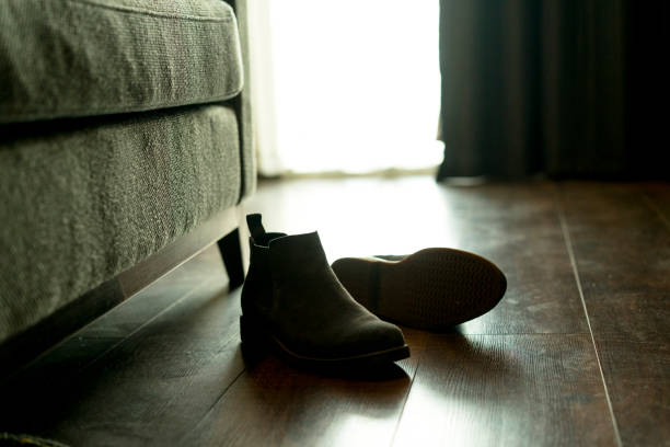 istock Suede shoes on floor 891404090