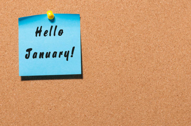 istock Hello January - business concept with text - written on sticker pinned at notice board, Empty space 891404704