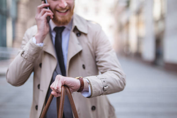 istock Businessman walking in the city 891411038
