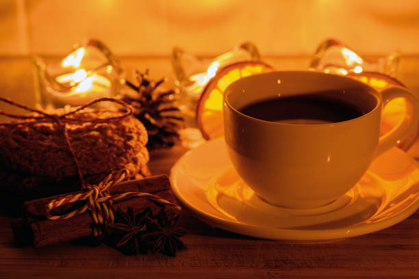 istock Cozy still life with tea, candle light and cookies 891411776