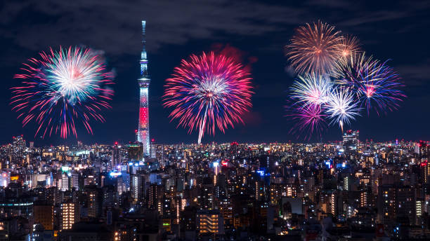 istock Tokyo cityscape Night light with fireworks 1 891412936