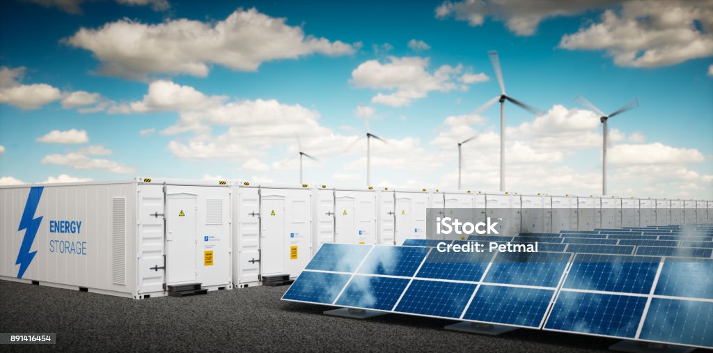 Concept of container Li-ion energy storage system. Renewable energy power plants - photovoltaics, wind turbine farm and  battery container. 3d rendering. Concept of energy storage system. Renewable energy power plants - photovoltaics, wind turbine farm and  battery container. 3d rendering. Battery Stock Photo