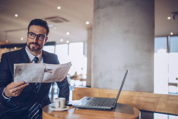 istock Man reading today news 891418956