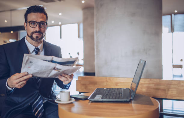 istock Man reading the news 891419138
