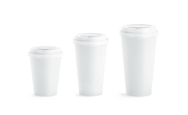 Blank white disposable paper cup mock ups with closed lids Blank white disposable paper cup mock ups with closed lids isolated, 3d rendering. Empty coffee drinking mug mockup front view. Clear tea take away plastic package, cofe shop branding template. billy bowlegs iii stock pictures, royalty-free photos & images