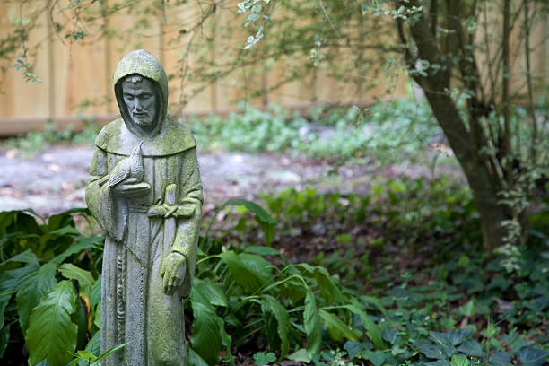 Saintly Stone Statue stock photo