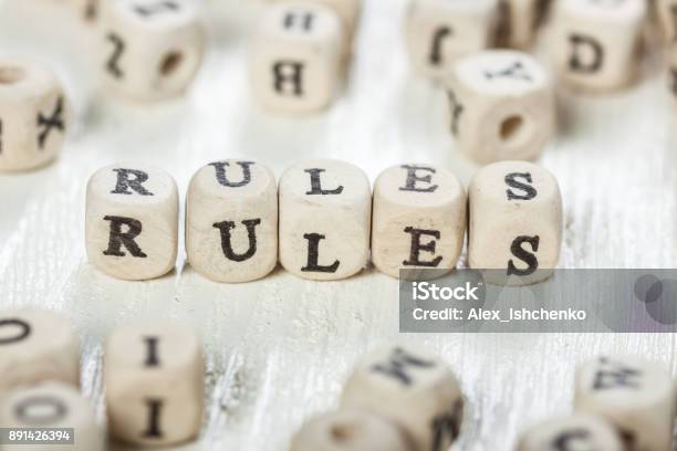 Rules Word Written On Wood Block Stock Photo - Download Image Now - Rules, Ruler, Book