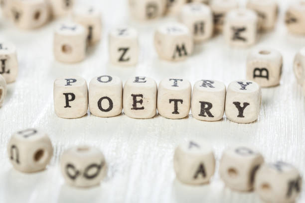 Poetry word written on wood block. Word POETRY formed by wood alphabet blocks. On old wooden table. poetry literature photos stock pictures, royalty-free photos & images