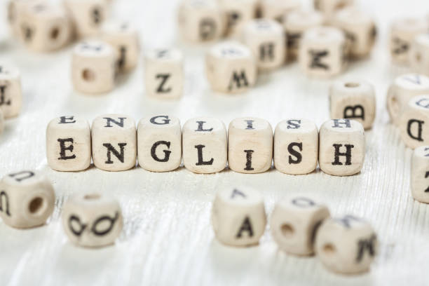 istock English word written on wood block. 891429740