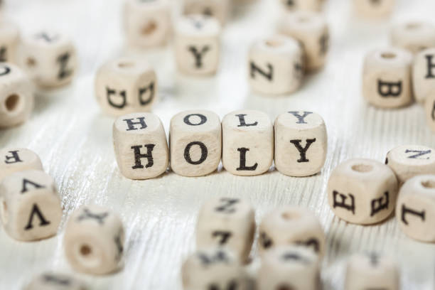 istock Holy word written on wood block. 891433464