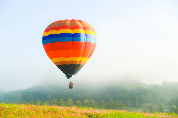 istock balloon flying in the sky fog 891440114