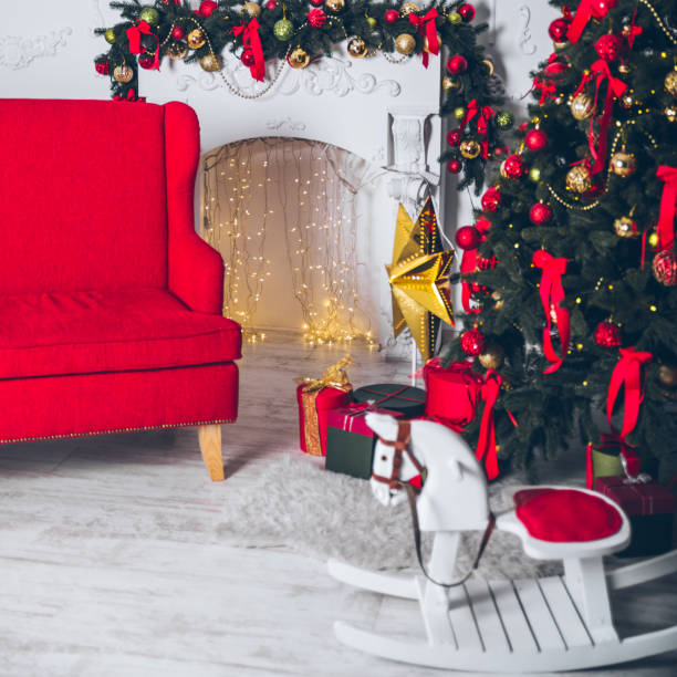 istock Beautiful decorated fireplace and Christmas tree 891444294