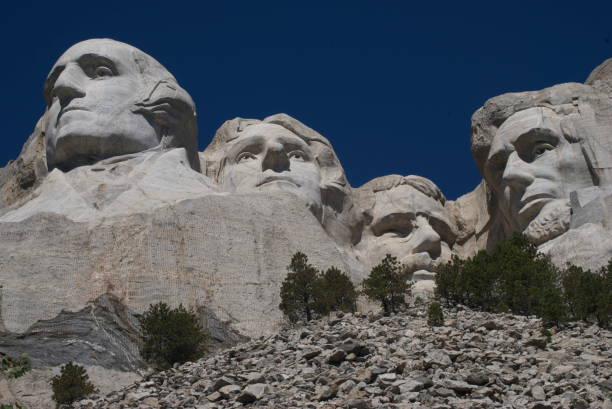 Mount Rushmore in Rapid City South Dakota Mt Rushmore Monument is a travel destination that brings many people to South Dakota. It´s very impressive, and a great way to remember these great presidents of the USA. theodore roosevelt us president stock pictures, royalty-free photos & images