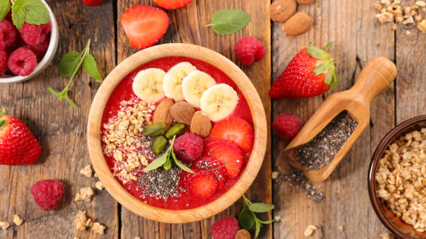 istock smoothie bowl with cereal and fruit 891452074