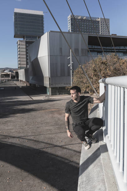 istock Man practicing parkour in Barcelona Catalonia Spain 891453090