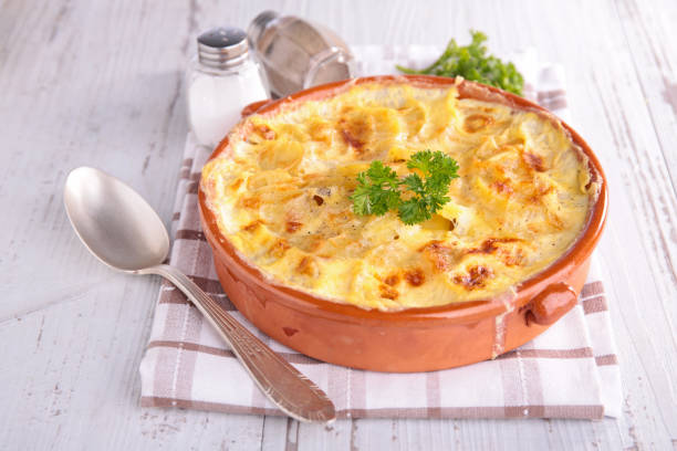 istock potato gratin with cheese and cream 891466176