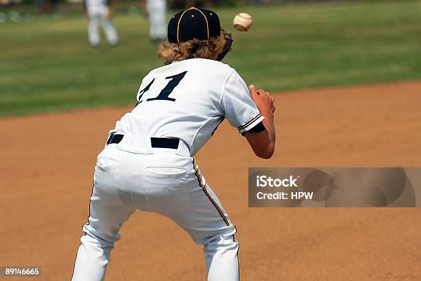 Catching Ball On First Base Stock Photo - Download Image Now - Baseball - Ball, Baseball - Sport, Teenager