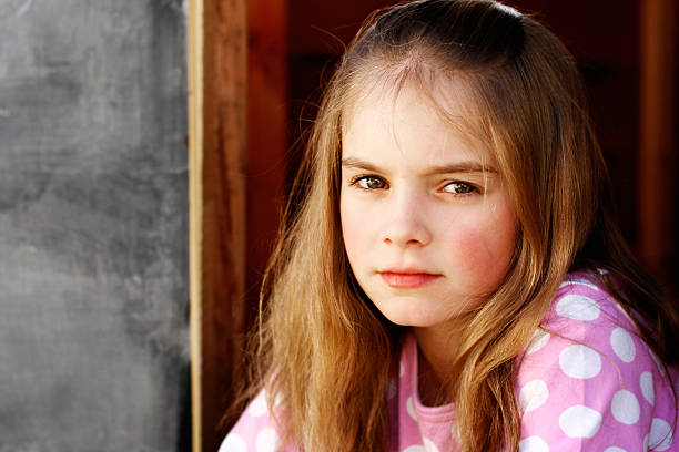 portrait of girl with long blond hair close up