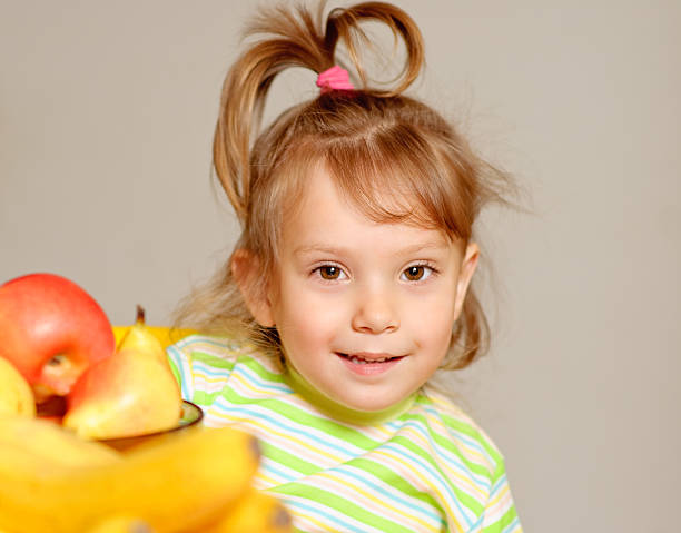 istock Girl and fruit 89147271