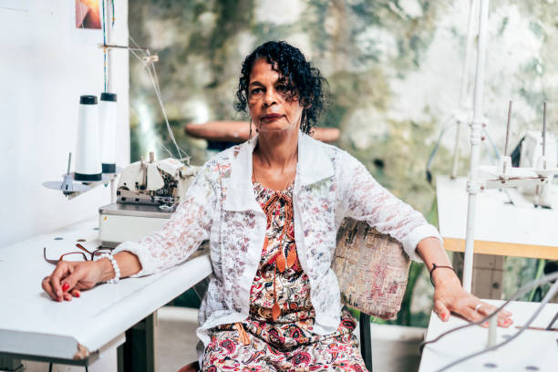 istock brazilian woman at sewing machine 891483156