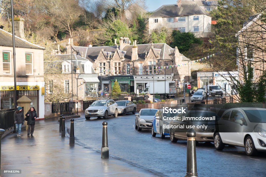 The Town of Dunblane in Scotland Dunblane,Scotland,UK-December 04,2017: The town centre of the quaint town of Dunblane in Scotland famous for tennis stars Andy & Jamie Murray and infamous for the tragic mass shootings of many children and their teacher in the middle 1990's. Capital Cities Stock Photo