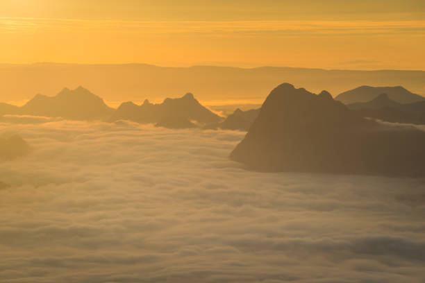 istock Sunrise and the mist in winter morning 891484250