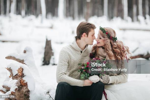 Bride And Groom In Winter Forest Moment Before A Kiss Artwork Stock Photo - Download Image Now