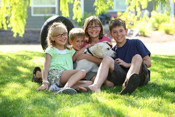 istock Group portrait of kids with dog 89149187