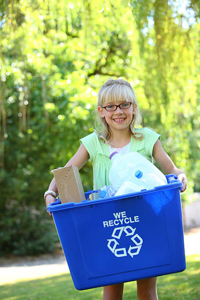 istock Young girl holding recycle bin 89149189