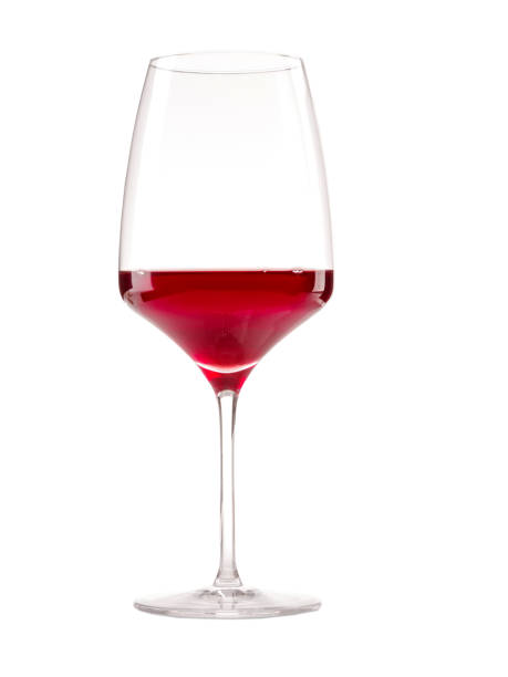 istock Glass of light red wine on white isolated background 891497732