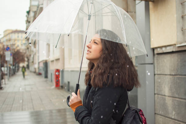 istock Woman in a rainy season 891497752