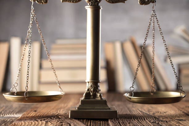 istock Judges gavel, book background. Bokeh. 891498234