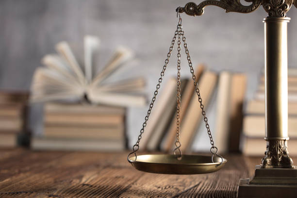 istock Judges gavel, book background. Bokeh. 891498376