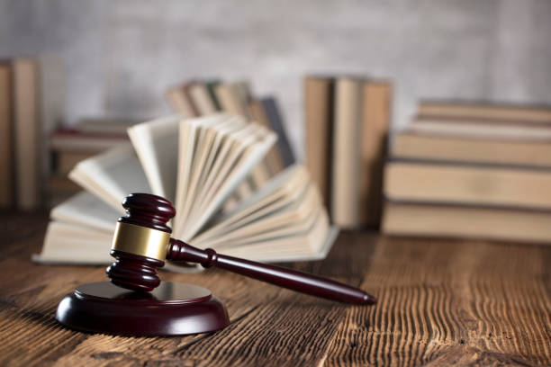 istock Judges gavel, book background. Bokeh. 891501076