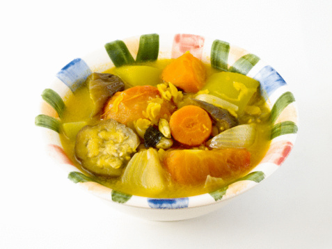 Mixed vegetables in a white dish.