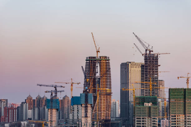istock Large Construction Site with Cranes at Sunset, Beijing, China 891506598