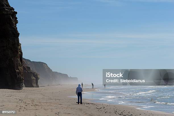 Beach With People Relaxing Stock Photo - Download Image Now - Distant, People, Beach