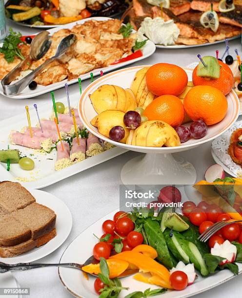 Fresh Vegetables Fruits And Appetizers On Served Banquet Table Stock Photo - Download Image Now