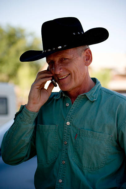 istock Cowboy and Cell Phone 89151136