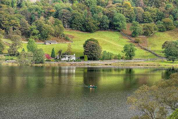 Canoeing on Rydal Water  grasmere stock pictures, royalty-free photos & images