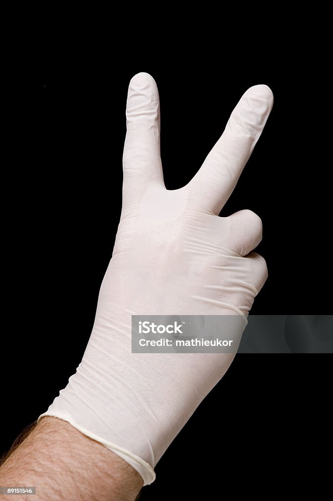 保護ゴム手袋-ピースサイン - カラー画像のロイヤリティフリーストックフォト