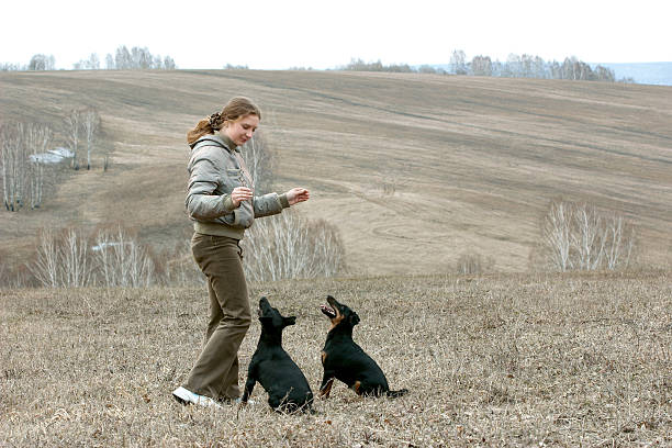 istock The girl with two dogs 89151833