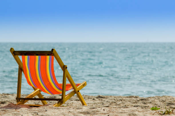 istock beach chair on the beach 891522490