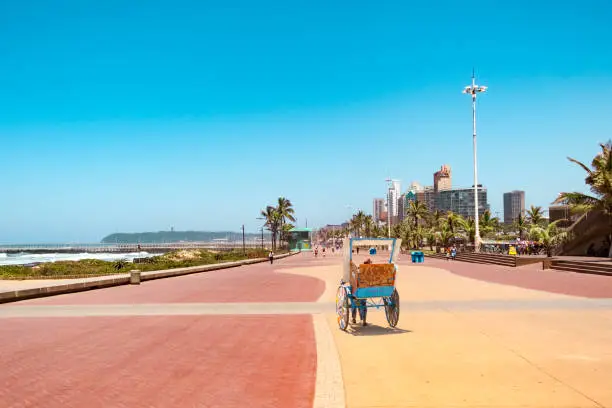 Promenade of Durban with traditional rickshaw driving on it