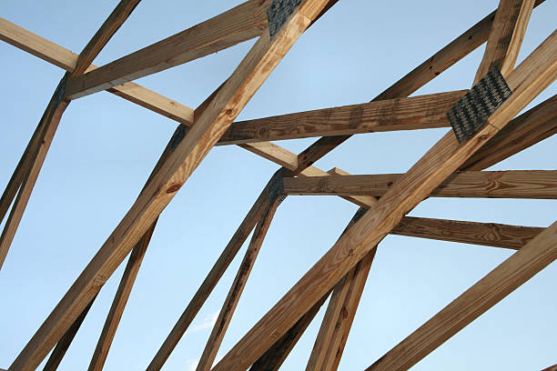 istock Roofing Trusses Against Blue Sky 89152392