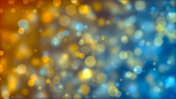 Orange, blue and silver particles. Bokeh background stock photo