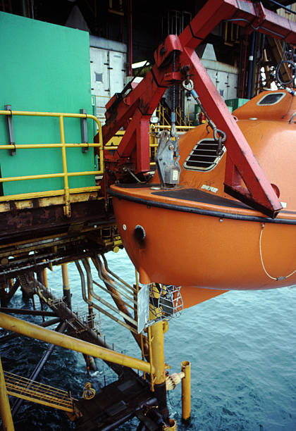 istock Lifeboat on oil rig 89152843