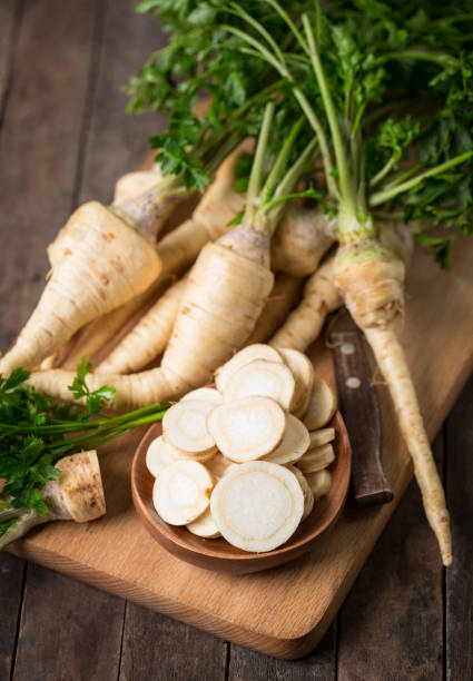 istock Fresh parsley root on the wooden table 891531972